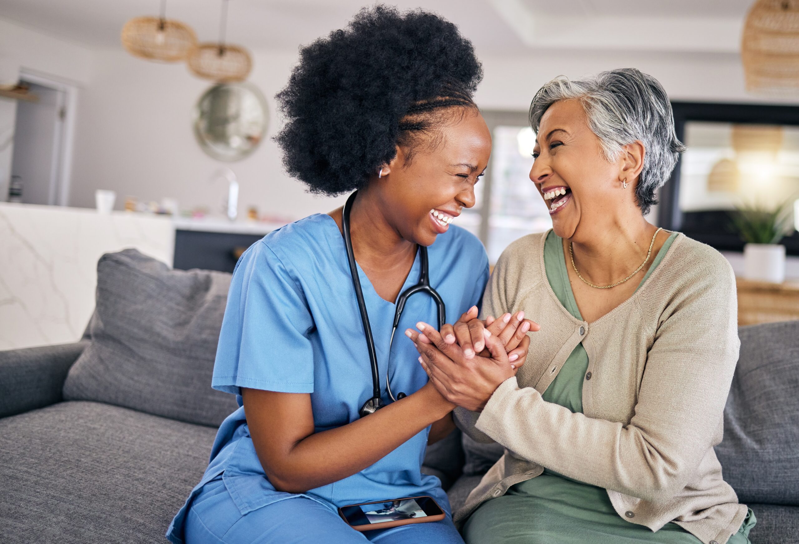happy relationship between nursing and elderly woman